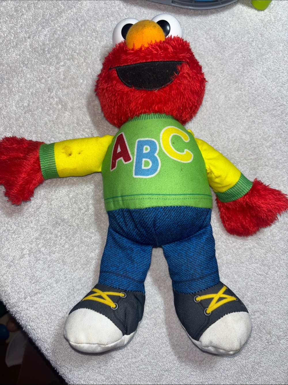 Sesame Street Bi-lingo Elmo ABC Plush Toy - Red, Yellow, Green, Blue